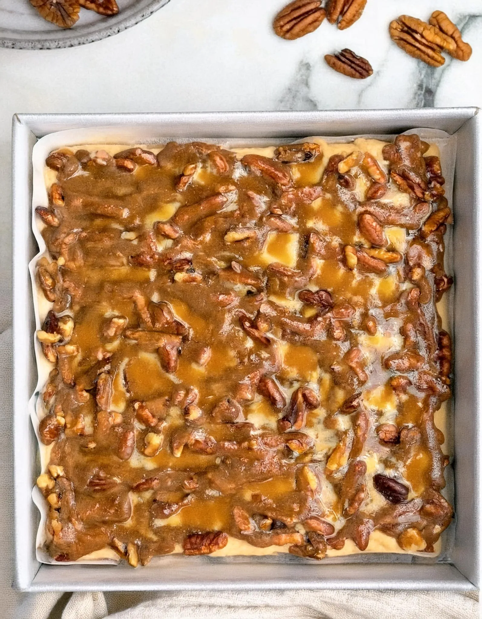 Praline Crumb Caramel Cheesecake Bars